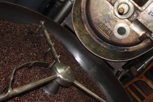 Photo of coffee beans cooling down after being roasted