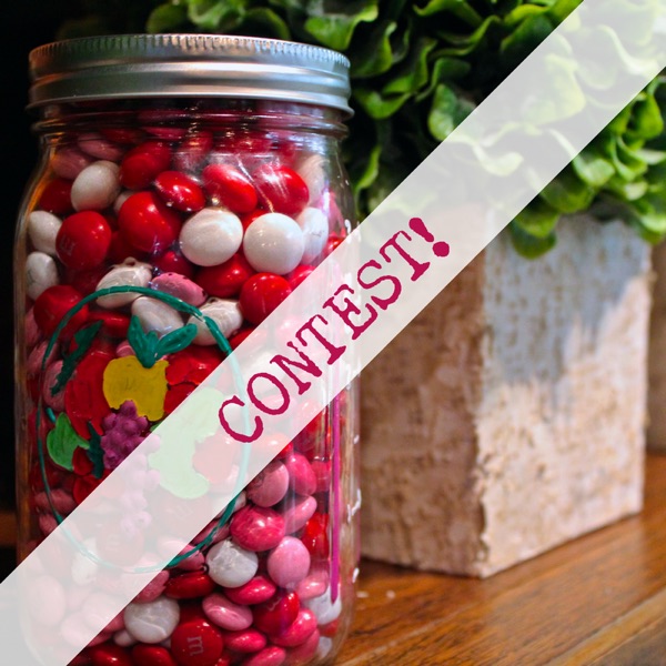 Photo of m&ms in a mason jar next to plant with a text overlay