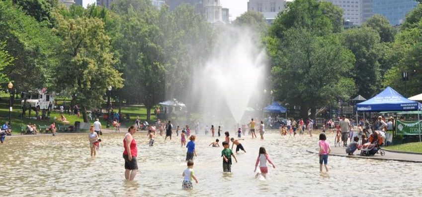 Photo of people playing in water at Frog Pond